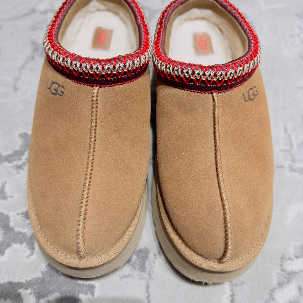 UGG Tazz II in Chestnut Tan Slippers with Red Patterned Trim. Size 10 worn once
